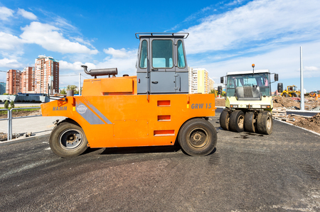 Samara, Russia - September 3, 2017: Road rollers working on the construction of new road in summer dayのeditorial素材