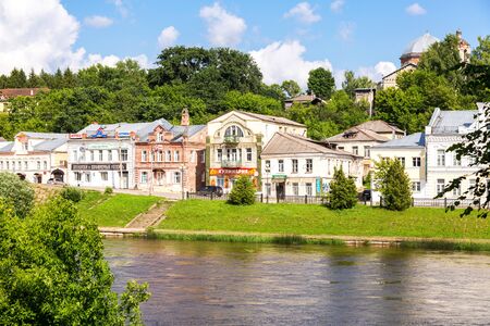 Torzhok, Russia - July 16, 2017: Provincial Russian town of Torzhok in summer sunny day. Old buildings at the embankment of the Tvertsa riverのeditorial素材