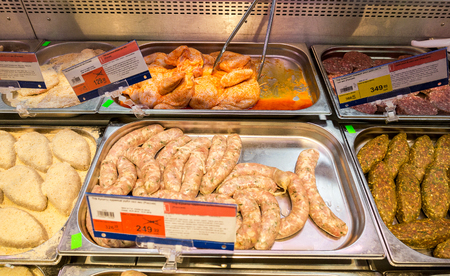 Samara, Russia - January 27, 2018: Showcase with different grades of meat and sausages in shopのeditorial素材