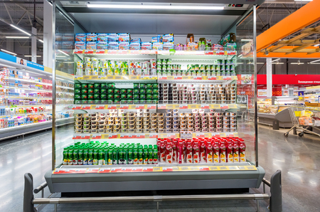 Samara, Russia - March 24, 2018: Fresh dairy products ready for sale in supermarket Lenta. One of largest retailer in Russiaのeditorial素材