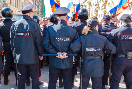 Samara, Russia - May 5, 2018: Police officers block an Leningradskaya street during an opposition...