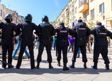 Samara, Russia - May 5, 2018: Police officers block an Leningradskaya street during an opposition protest rally ahead of President Vladimir Putin's inauguration ceremonyのeditorial素材