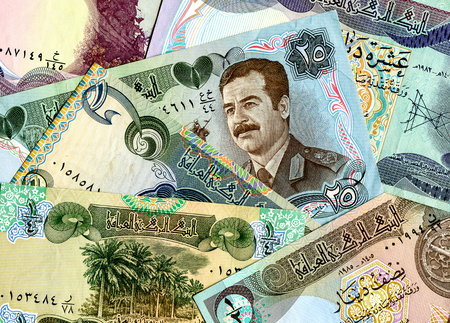 Background from old different banknotes of Iraq moneyの写真素材