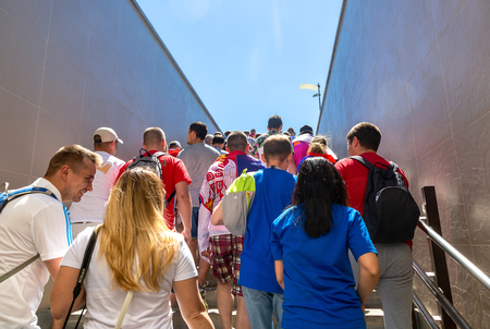 Samara, Russia - June 17, 2018: Football fans with flags of Serbia next to the Samara Arena stadium during the 2018 FIFA World Cupのeditorial素材