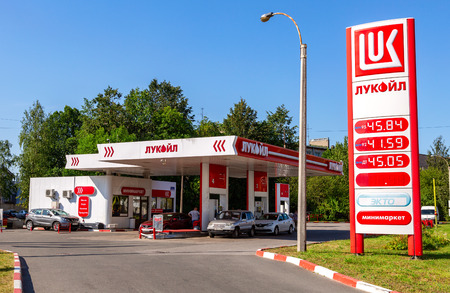 Saint Petersburg, Russia - August 10, 2018: Lukoil gas station with fueling cars.  Lukoil is one of the largest russian oil companiesのeditorial素材