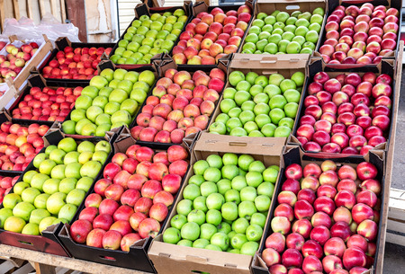 Fresh apples of new harvest ready to sale at the local farmers marketの写真素材