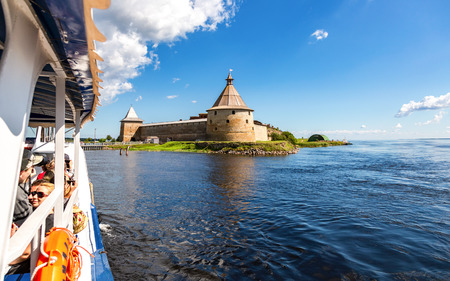 Shlisselburg, Russia - August 8, 2018: River cruise ship sailing on the Neva river to historical Oreshek fortress in summer sunny dayのeditorial素材