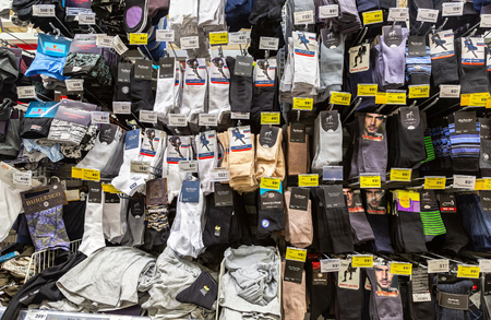 Samara, Russia - March 30, 2019: Different mans socks for sale at the chain supermarketのeditorial素材