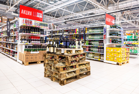 Samara, Russia - April 13, 2019: Various bottled alcoholic beverages ready for sale on supermarket shelvesのeditorial素材