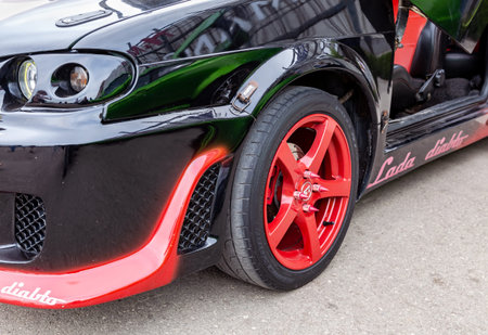 Samara, Russia - May 19, 2018: Modern tuned automotive wheel on light alloy disc with low profile...