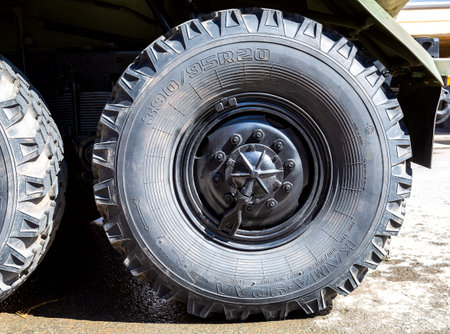 Samara, Russia - May 4, 2019: Close up view of Ural truck army vehicle wheel with Kama-Ural tire