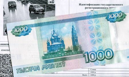 Samara, Russia - May 15, 2019: Receipt for payment of a fine for violation of traffic rules and moneyのeditorial素材