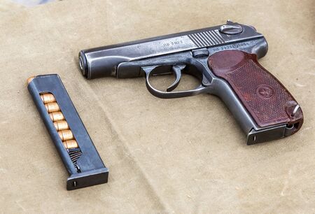 Samara, Russia - May 18, 2019: Old soviet Makarov army handgun with ammunitionのeditorial素材