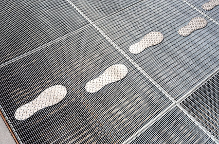 Stylized traces on the metal lattice as background