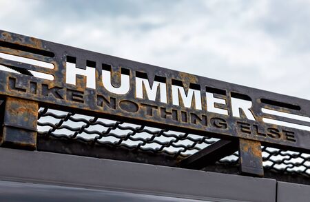 Samara, Russia - May 18, 2019: Hummer car logo and slogan against the skyのeditorial素材