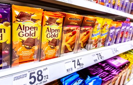 Samara, Russia - June 22, 2019: Various fresh chocolate ready for sale on the shelves in supermarketのeditorial素材