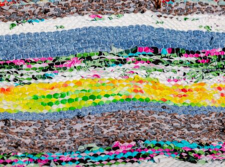 Woolen multicolored threads texture as background close upの写真素材