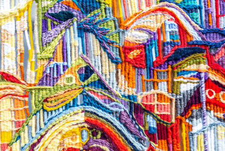 Woolen multicolored threads texture as background close up