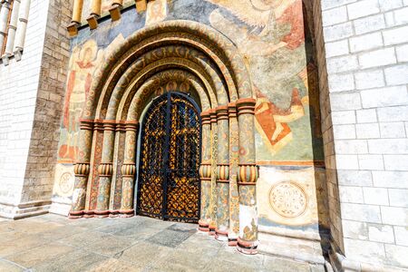Gate of the Assumption Cathedral of Moscow Kremlin. Ancient door painted with Christian icons. Moscow, Russiaの写真素材