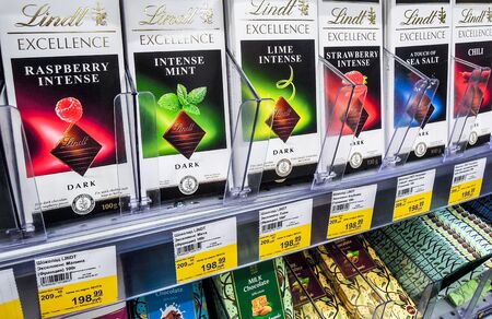 Samara, Russia - September 26, 2019: Various fresh Lindt chocolate ready for sale on the shelves in supermarketのeditorial素材