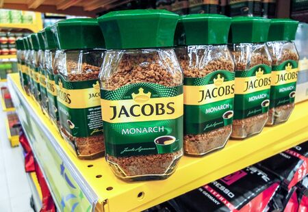 Samara, Russia - November 30, 2019: Coffee Jacobs Monarch on the shelf at the grocery storeのeditorial素材