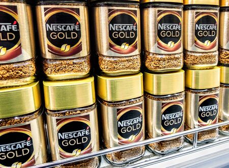 Samara, Russia - November 30, 2019: Nescafe Gold coffee on the shelf at the grocery storeのeditorial素材