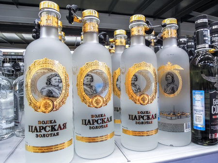 Samara, Russia - December 29, 2019: Russian vodka ready for sale on the shelf in superstore. Various...