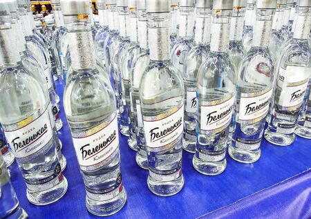Samara, Russia - February 22, 2020: Russian Belenkaya vodka ready for sale on the shelf in superstore. Various bottled alcoholic beverages and spirit drinksのeditorial素材