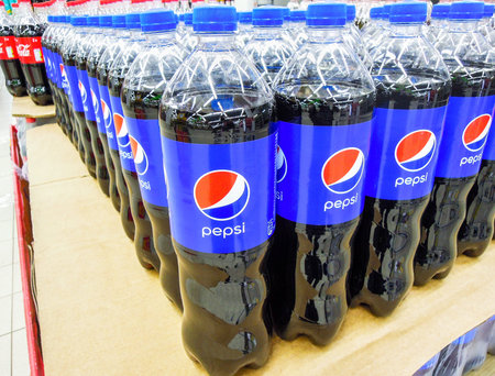 Samara, Russia - March 18, 2020: Pepsi Cola drinks ready for sale on the shelf in superstore....