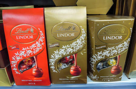 Samara, Russia - November 25, 2019: Lindt Lindor Chocolates in boxes on supermarket shelf. Lindt is a Swiss chocolatier and confectionery companyのeditorial素材