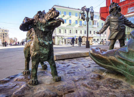 Samara, Russia - March 27, 2020: The small dog. Fragment of bronze monument "Uncle Stepa-militiaman" at the pedestrian city streetのeditorial素材