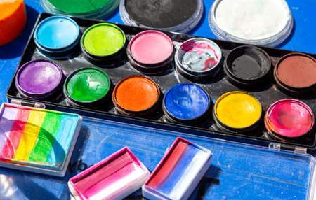 Different used colorful watercolor paint for drawing close upの写真素材