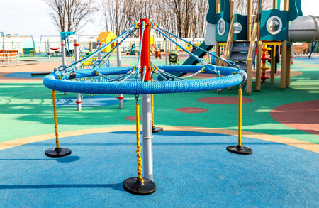 Samara, Russia - October 30, 2020: Children's playground for kids in new district with swing for...