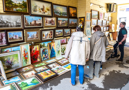 Samara, Russia - May 4, 2019: Paintings for sale on Leningradskaya street in sunny dayのeditorial素材