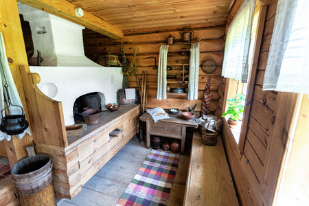 Konchansko-Suvorovskoe, Russia - July 22, 2017: Interior of the museum homestead of Generalissimo Alexander Suvorov. Russian traditional kitchen with stoveのeditorial素材