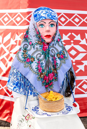 Samara, Russia - February 18, 2018: Holiday of Shrovetide in Russia. Big doll for the burning as symbol of winter during the Maslenitsa or Pancake Weekのeditorial素材