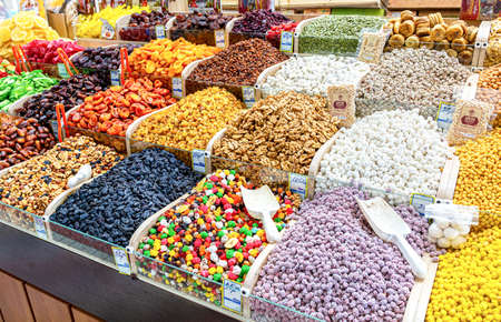 Samara, Russia - May 25, 2021: Various nuts, candied and dried fruits at the food marketのeditorial素材