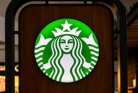 Samara, Russia - June 3, 2017: Starbucks logo close up. Starbucks is the largest coffeehouse company in the worldのeditorial素材