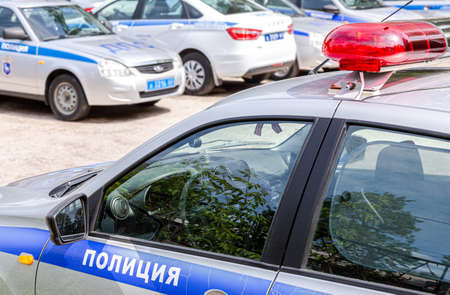 Samara, Russia - June 2, 2021: Russian police patrol cars of the State Automobile Inspectorate parked on the city street in summer dayのeditorial素材