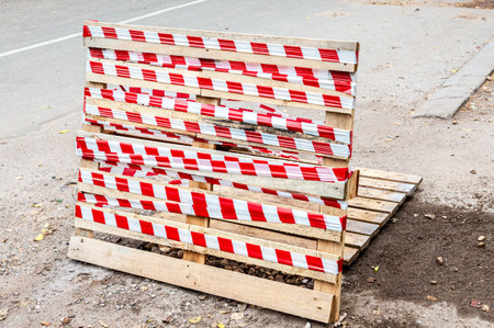 Handmade stop road sign on the road close up. Road works traffic sign at the city street