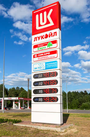 Mordovia, Russia - July 5, 2021: Guide sign, indicated the price of the fuel on the gas station Lukoil. Lukoil is one of the largest russian oil companiesのeditorial素材