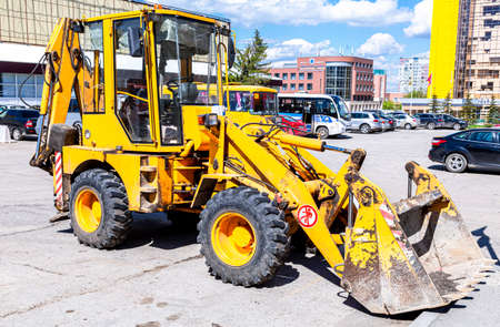 Samara, Russia - May 13, 2017: Tracror loader on the construction of new road. Industry of roadwork repair. road construction machineryのeditorial素材