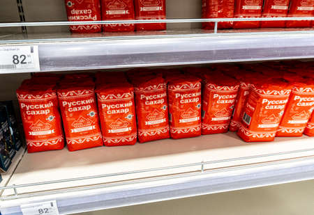 Samara, Russia - March 17, 2022: Packaged sugar to sale on the shelf in a superstoreのeditorial素材