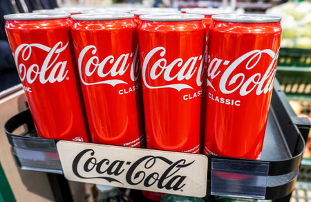 Samara, Russia - March 22, 2022: Coca Cola bottled ready for sale on the shelf in superstore....