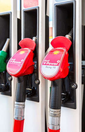 Samara, Russia - July 4, 2021: Filling column with different fuels at the Shell gas station. Shell V-power fuel station. selective focusのeditorial素材