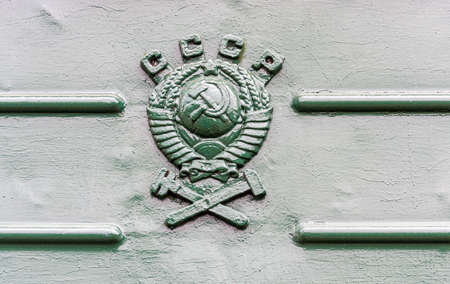 Coat of arms of former state the USSR on the retro train. Emblem of the soviet railwayの写真素材