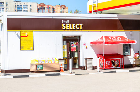 Samara, Russia - May 07, 2022: Shell Select storefront at Shell gas station. Royal Dutch Shell is an...
