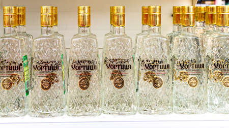 Samara, Russia - May 8, 2022: Hortitsa vodka ready for sale on the shelf in a superstore. Various bottled alcoholic beverages and spirit drinks. selective focusのeditorial素材