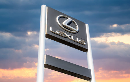 Samara, Russia - June 18, 2022: Lexus automotive dealership sign against the sunset sky. Lexus is...