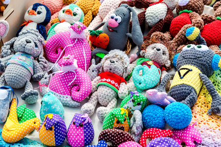 Samara, Russia - July 16, 2022: Sale of various knitted soft toys on in the city parkのeditorial素材